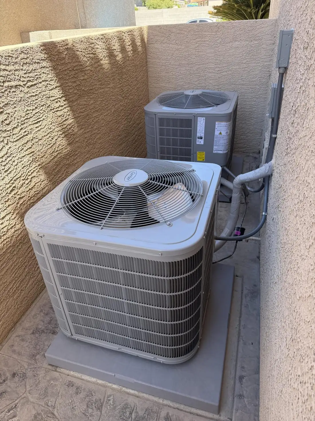 Two new Carrier AC condensers installed by Complete Care at a Las Vegas property